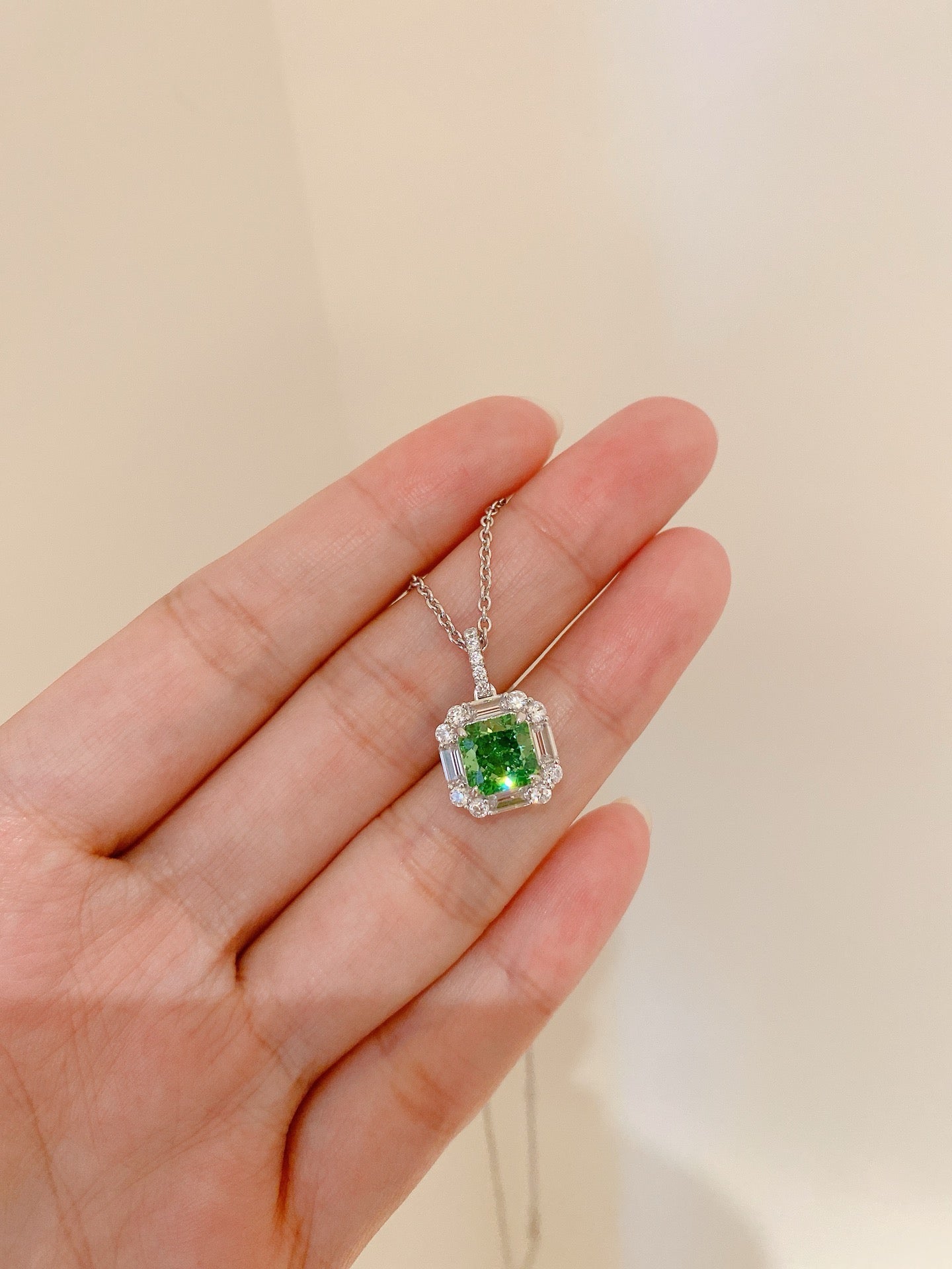 Emerald Elegance Halo Pendant