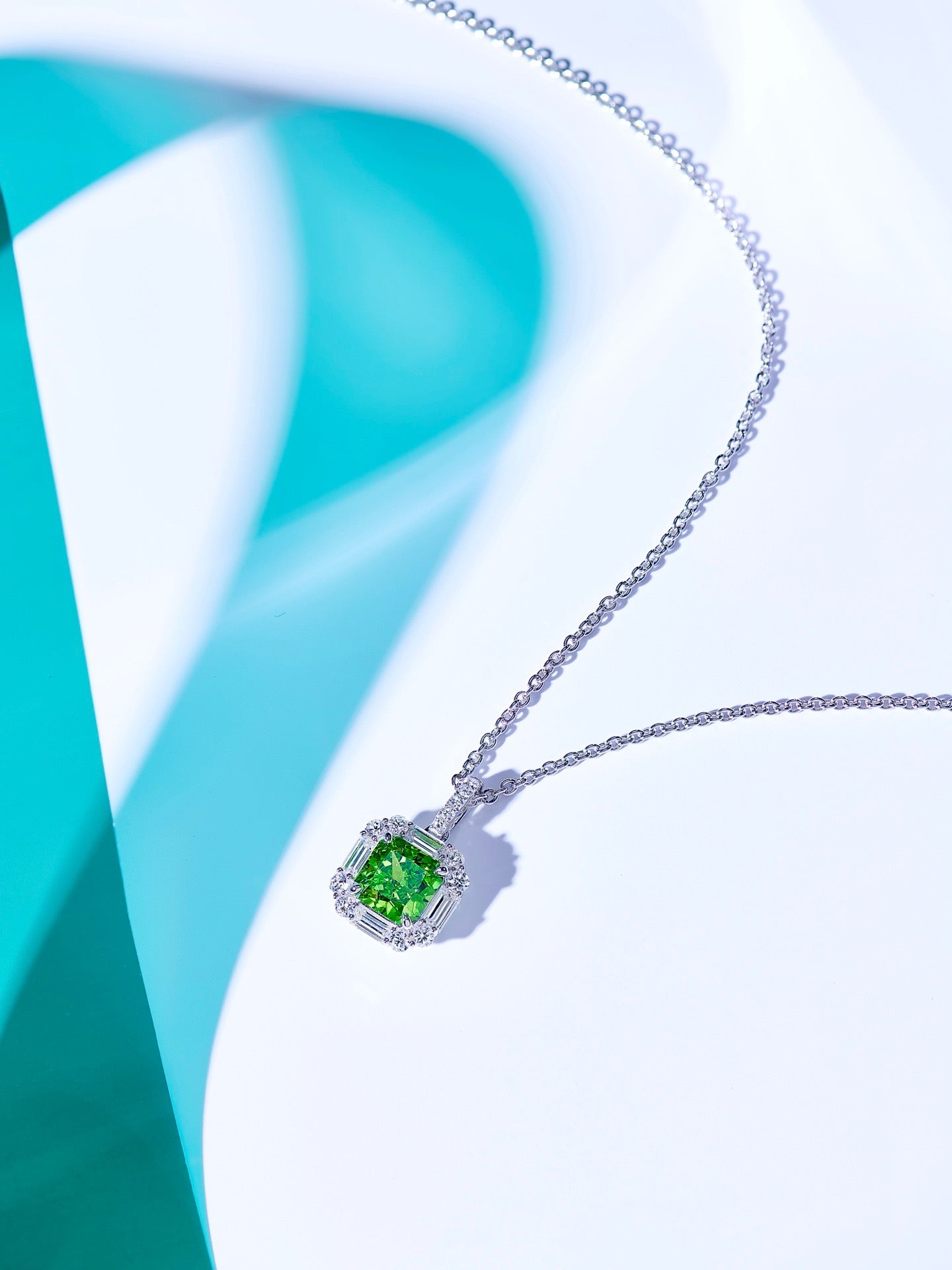 Emerald Elegance Halo Pendant