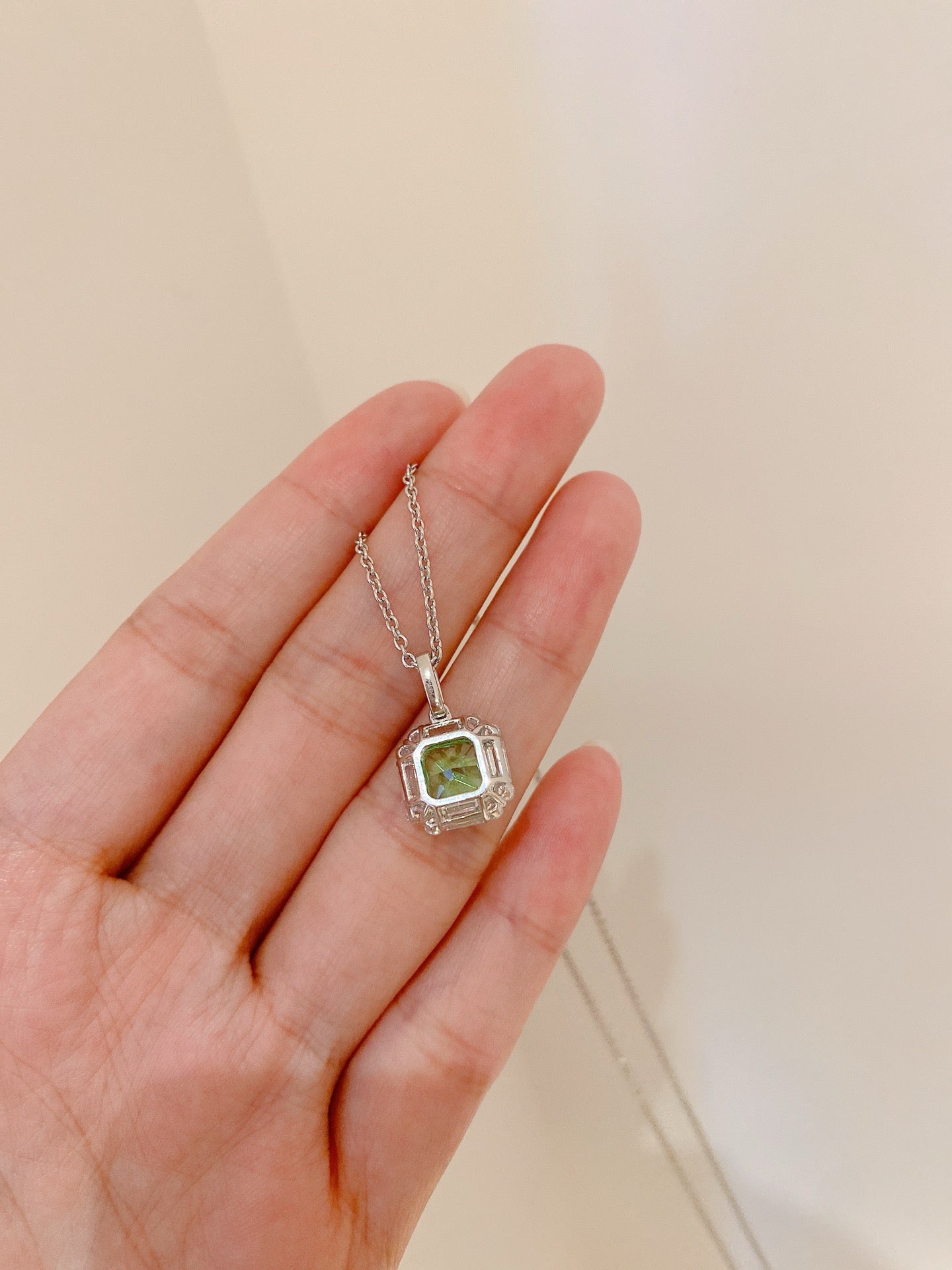 Emerald Elegance Halo Pendant