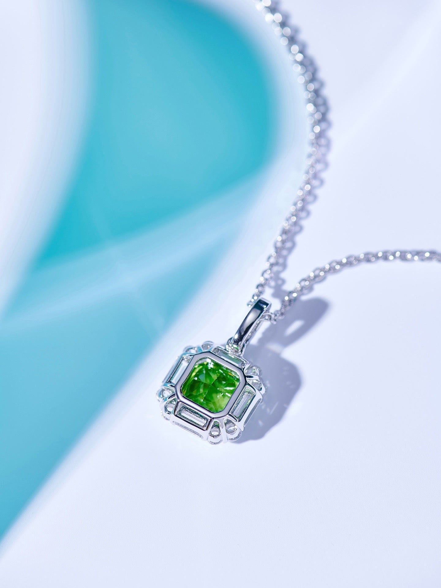 Emerald Elegance Halo Pendant